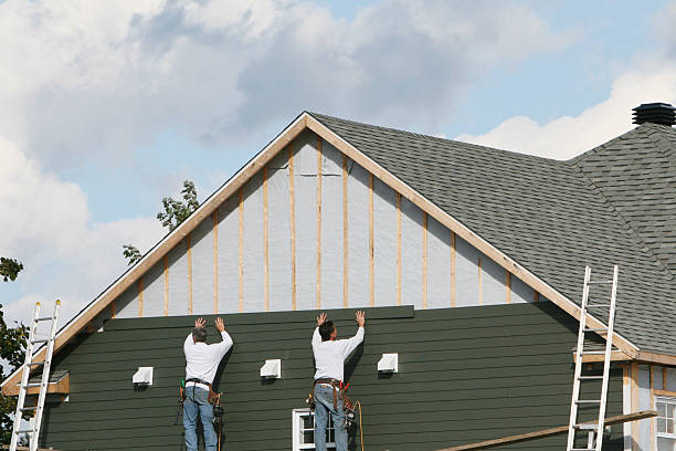 Professional Siding technician working in Littleton, CO
